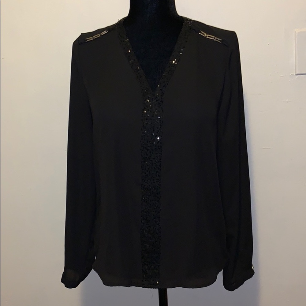 Used in excellent condition Black detailed blouse